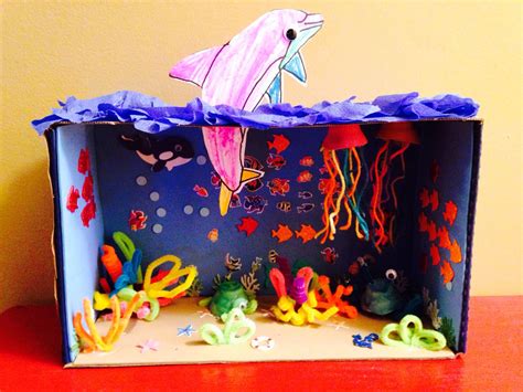 They can be painted blue and have sand placed in them to represent the sea. . Diorama of ocean in shoebox